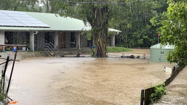 Homes in Pimpama are being inundated by rising floodwaters. Picture: Charlton Hart