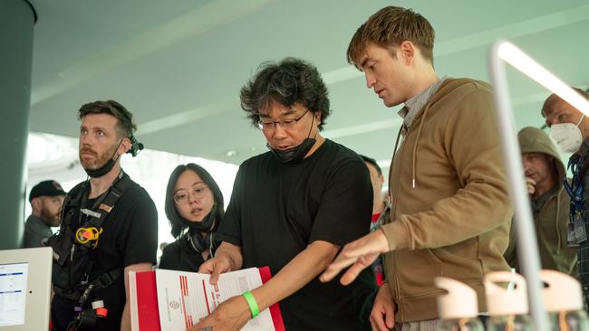 Director Bong Joon Ho on set filming Mickey 17