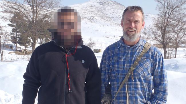 Harry Moffitt with his former interpreter in Kabul. Picture: Supplied