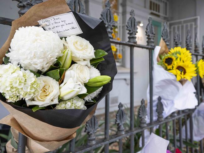 Flowers left outside the Paddington terrace Baird rented. Picture: Monique Harmer