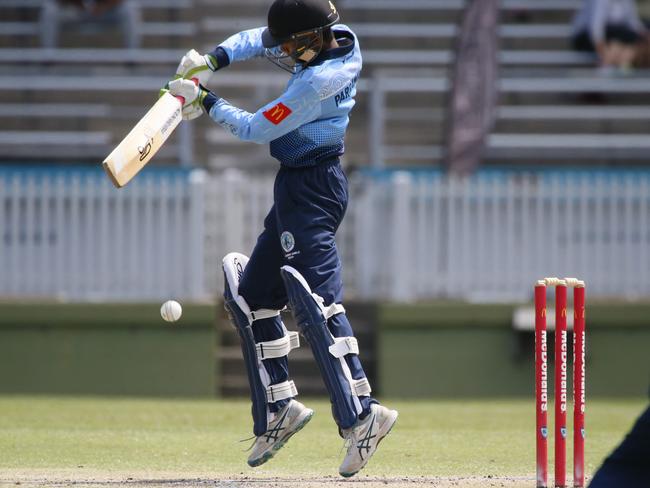 Aston Wijesinghe gets over the ball. Picture: Warren Gannon Photography