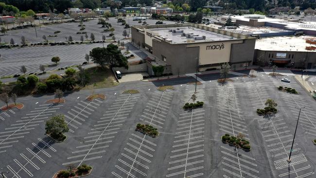 The parking lot at Hilltop Mall in Richmond, Calif., sat empty on March 17 following a local shelter-in-place order designed to slow the spread of Covid-19. Picture: Getty Images