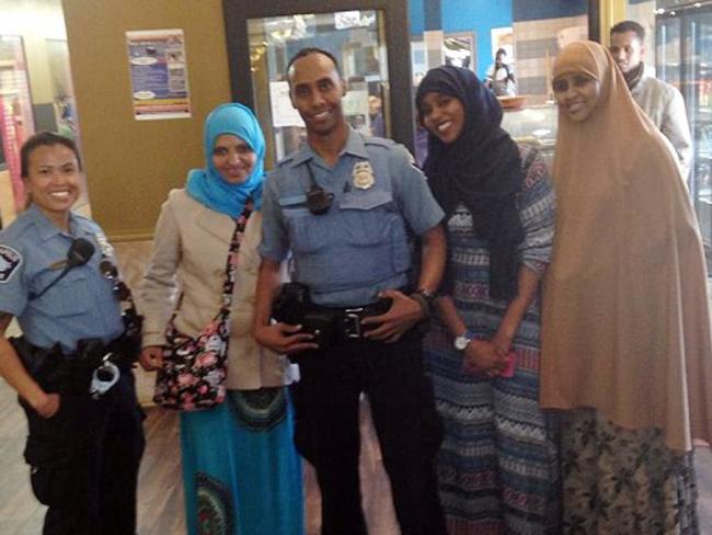 Mohamed Noor (centre) fatally shot an Australian bride-to-be. Picture: Facebook/Betsy Hodges