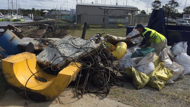 Ocean Crusaders removed a huge pile of rubbish on day one of their clean up of Cabbage Tree Creek, Shorncliffe. Picture: Ocean Crusaders