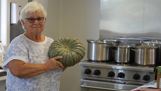 Kitchen controller Sandra Gaddes with a you beaut Queensland blue. Picture: Chris Knight