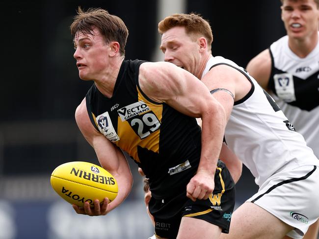 Dom Brew in the thick of it during the VFL grand final. Picture: Michael Willson/AFL Photos via Getty Images