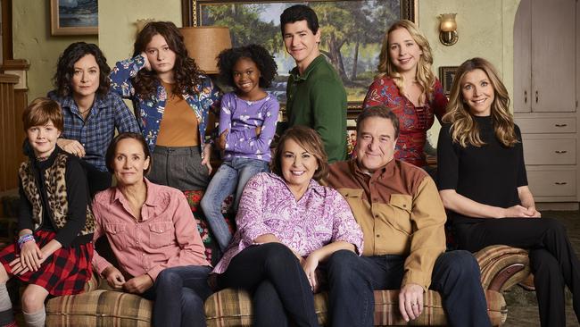 Roseanne Barr and John Goodman with the cast of her hit show. Picture: ABC.