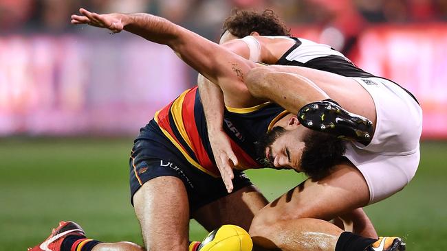 Wayne Milera of the Adelaide Crows competes with Steven Motlop of Port Adelaide during the round 20 Showdown. Picture: Mark Brake/Getty Images