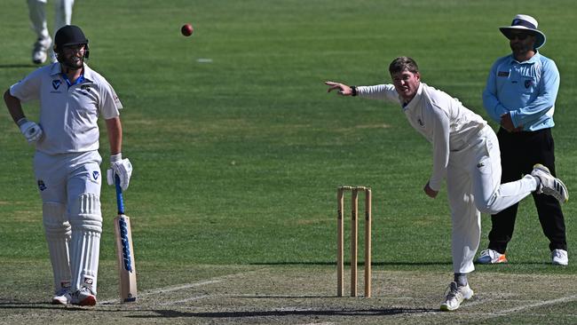 VSDCA: St Bernard’s Conor McGuire watches as Brunswick’s Ben Moss rolls the arm over. Picture: Andy Brownbill