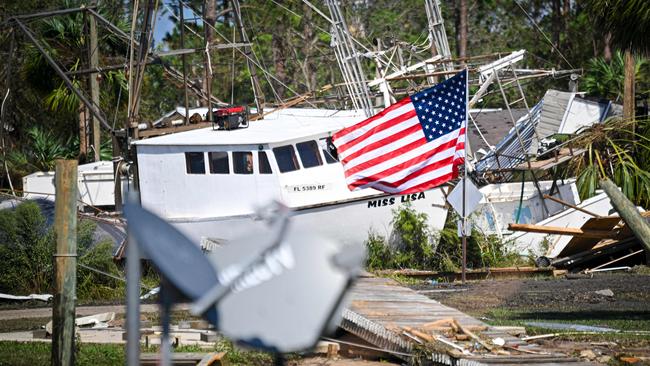 A boat which was pushed ashore by Hurricane Helene sits on dry ground in Keaton Beach, Florida. Picture: AFP