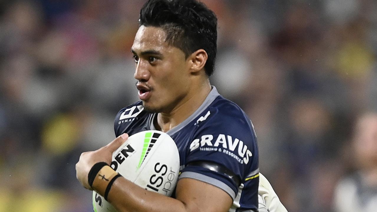 TOWNSVILLE, AUSTRALIA - MAY 21: Murray Taulagi of the Cowboys makes a break during the round 11 NRL match between the North Queensland Cowboys and the Melbourne Storm at Qld Country Bank Stadium, on May 21, 2022, in Townsville, Australia. (Photo by Ian Hitchcock/Getty Images)