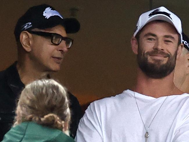 SYDNEY, AUSTRALIA - MARCH 26:  Actors Chris Hemsworth, Jeff Goldblum and Russell Crowe watch the round three NRL match between the South Sydney Rabbitohs and the Sydney Roosters at Stadium Australia on March 26, 2021, in Sydney, Australia. (Photo by Cameron Spencer/Getty Images)
