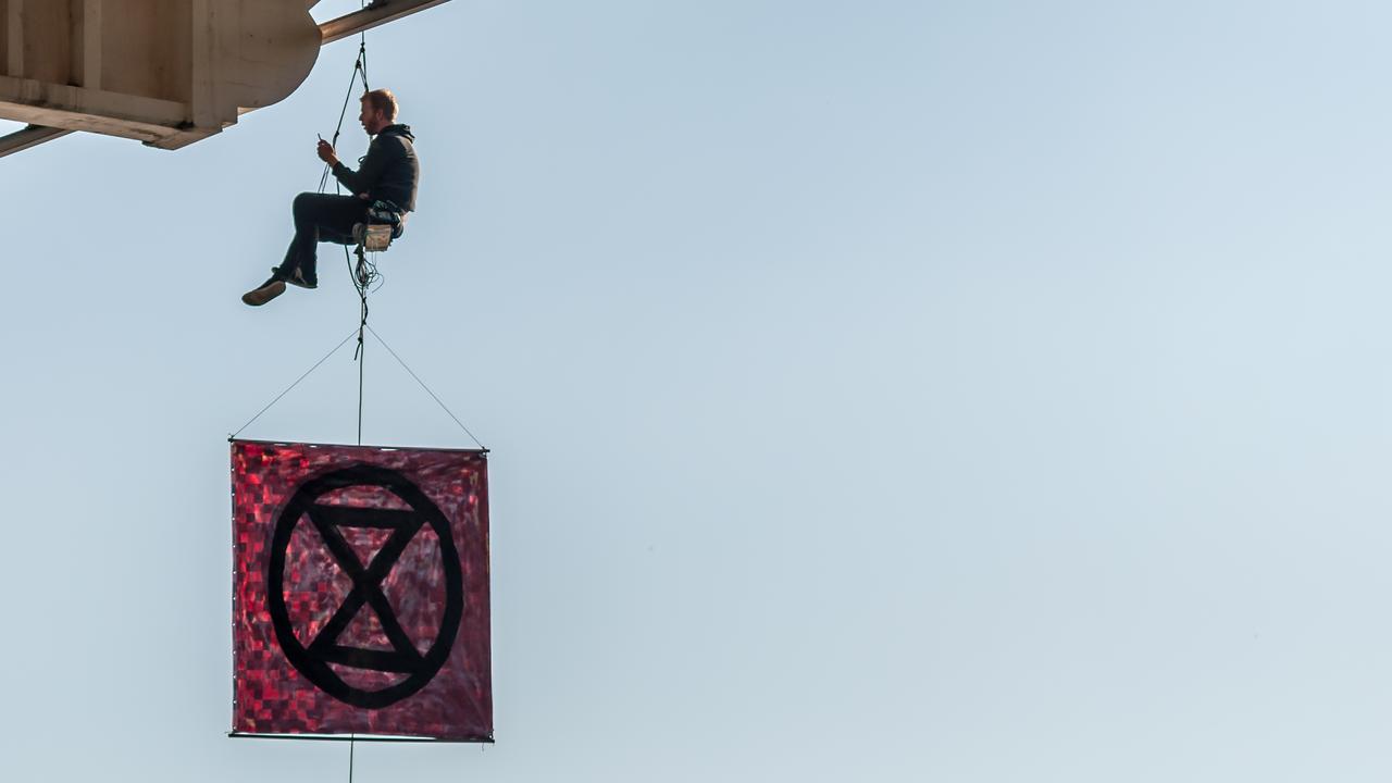 Extinction Rebellion protester abseiling William Jolly Bridge. 19 August 2019. Picture: Supplied.