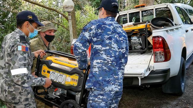 Residents have had to rely on power generators while the effort to restore power continues. Picture: Ian Currie