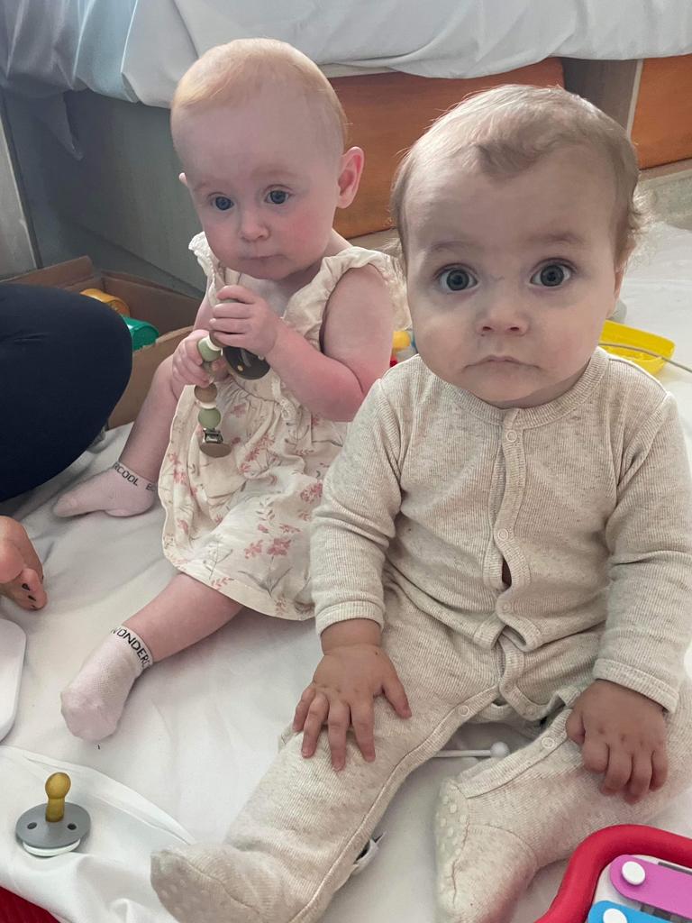 Levi O'Neill was turning blue due to low oxygen levels. He is pictured with a friend while waiting for surgery, after being flown to Queensland Children's Hospital in Brisbane when Dr Reeves was unavailable. Picture: Supplied.