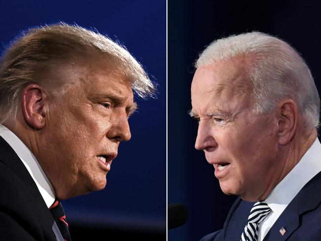 TOPSHOT - (COMBO) This combination of pictures created on September 29, 2020 shows US President Donald Trump (L) and Democratic Presidential candidate former Vice President Joe Biden squaring off during the first presidential debate at the Case Western Reserve University and Cleveland Clinic in Cleveland, Ohio on September 29, 2020. (Photos by JIM WATSON and SAUL LOEB / AFP)