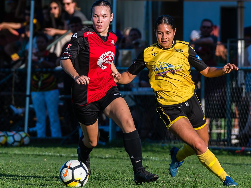 Leichhardt's Lydia Yong and Edge Hill United's Louise Fowler fight for possession in the Women's FNQ Premier League grand final between Edge Hill United and Leichhardt at Endeavour Park. Picture: Emily Barker