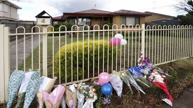 Flowers and tributes at the front of the home Picture: David Geraghty