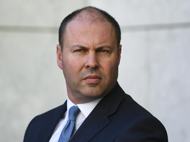 Australian Treasurer Josh Frydenberg will be under pressure to turn on the economic taps further after the UK guaranteed 80 per cent of workers’ pay. Picture: AAP