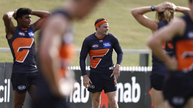 Heath Shaw looks on during a running session over summer.