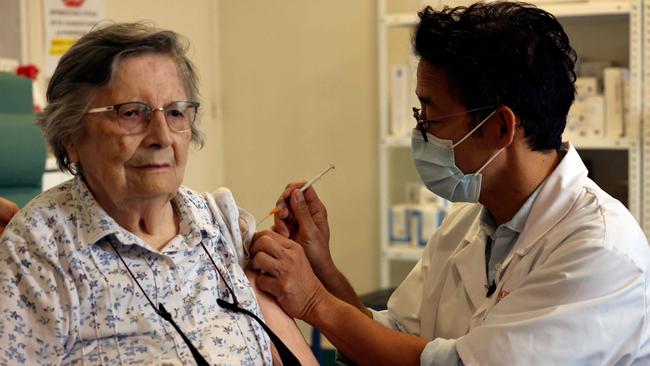 An elderly patient receives the 3rd dose of the Pfizer-BioNtech Covid-19 vaccine in Paris. The UK has joined France in recommending a booster shot for the vulnerable. Picture: AFP.