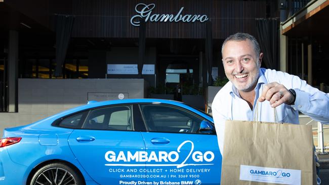 Gambaro 2 go. Co-owner of Gambaro in Caxton Street Donny Gambaro promotes their 'Gambaros 2 Go' BMW delivery and takeaway service. 29.04.2020 Picture: Renae Droop