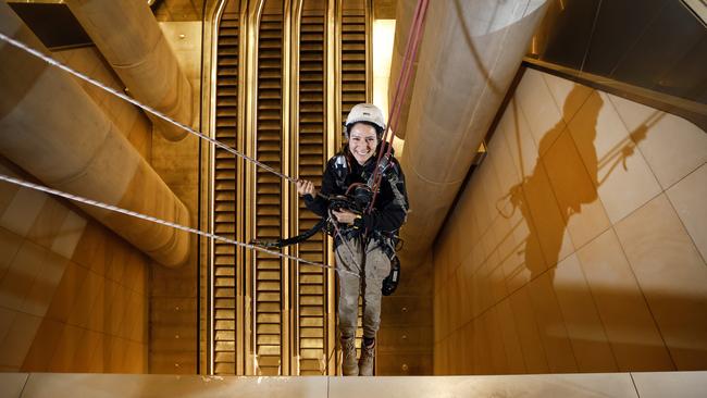 Pictured at Gadigal Metro Station in Sydney is Sandra Castano who is in the process of doing some last minute cleaning of any sandstone at the new city stations along the Sydney Metro line. the band new Metro Station. Picture: Richard Dobson