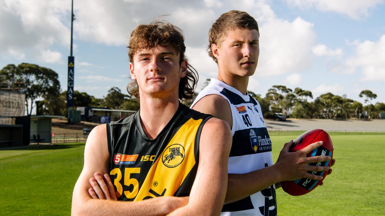 Ben Ridgway, of Glenelg, and Tom Schirmer, of South Adelaide, at Noarlunga Oval. Picture: Morgan Sette