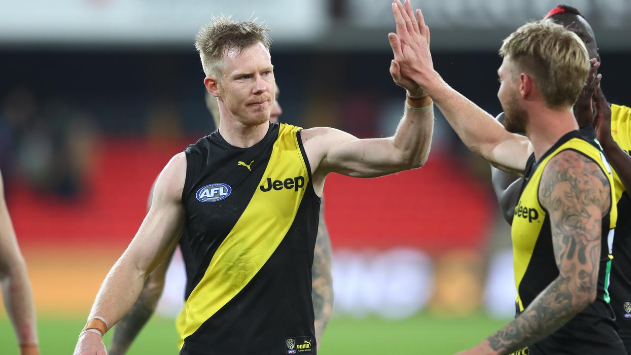 Richmond acting captain Jack Riewoldt high-fives Nathan Broad after last week’s win over North Melbourne. Picture: Getty Images