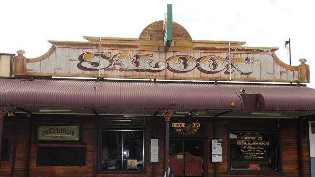 A bartender served beer to a drunk woman at Bojangles Saloon