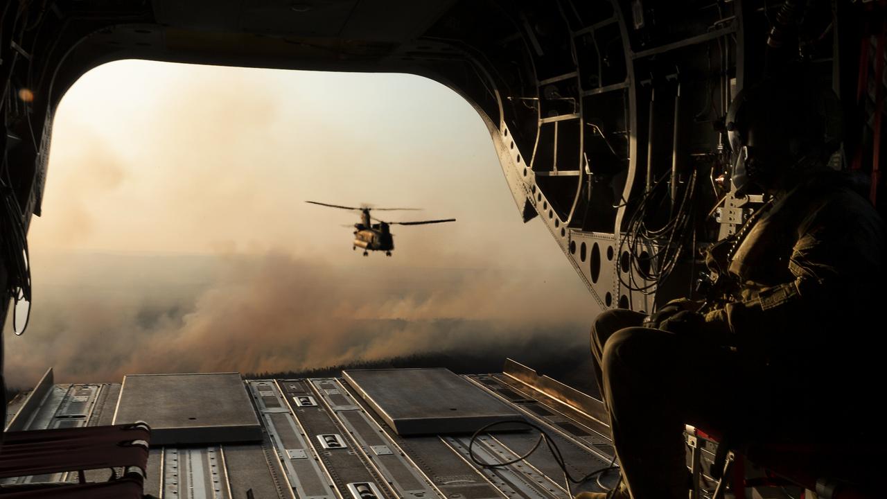 Australian Army CH-47 Chinooks from the 5th Aviation Regiment,return from delivering hay bales to remote bushfire effected farms on Kangaroo Island during OP Bushfire Assist. *** Local Caption *** CH-47 Chinook helicopters from the Australian Army's 5th Aviation Regiment have been helping to quickly pick up and drop off hay to feed livestock at hard to reach properties on Kangaroo Island as part of Operation Bushfire Assist 2019-2020.