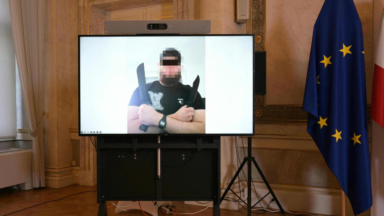 A screen displays a photo of a man arrested in connection with an Islamist attack plot that caused the cancellation of the Vienna leg of a tour by American megastar Taylor Swift. Picture: AFP