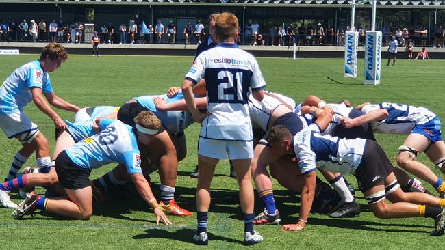 Action in the match between the Gen Blues Junior and a Schools Selection side.