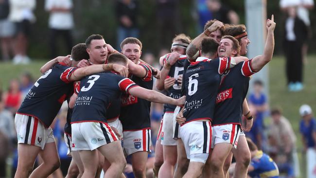 Erina players celebrate the win. Picture: Sue Graham