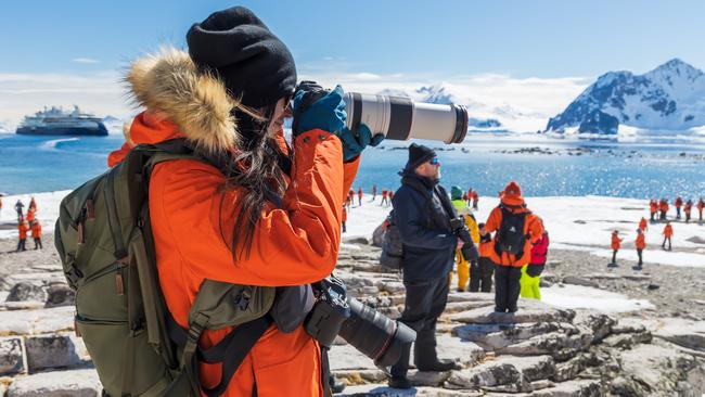 Lindblad passengers take in the sights at Calmette Bay. Picture: Andrew Peacock