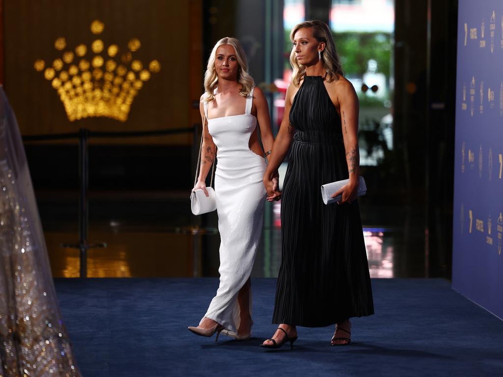 Ash Gardener, who is also a favourite and the reigning Belinda Clark Medallist, with her partner Monica Wright. Photo by Morgan Hancock/Getty Images for Cricket Australia