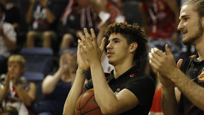 LaMelo Ball cheers on his teammates. Picture: Brent Lewin/Getty