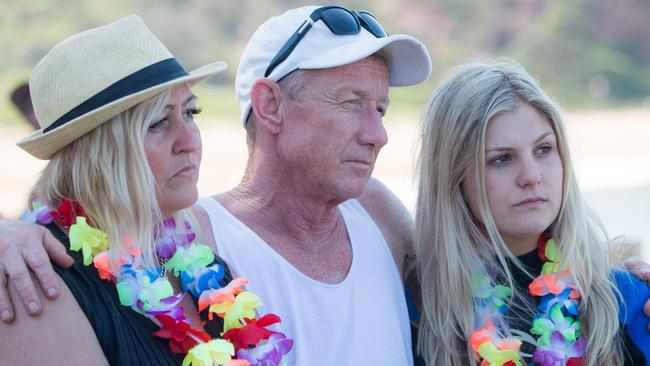 Lachie’s family at a ‘paddleout’ to scatter his ashes last year.