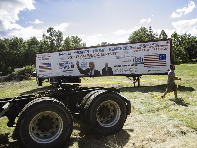 A tractor trailer containing pro Trump slogans is seen on the side of the road near where President Donald J Trump is expected to speak at Old Forge, Pennsylvania, USA. picture: Angus Mordant for News Corp Australia