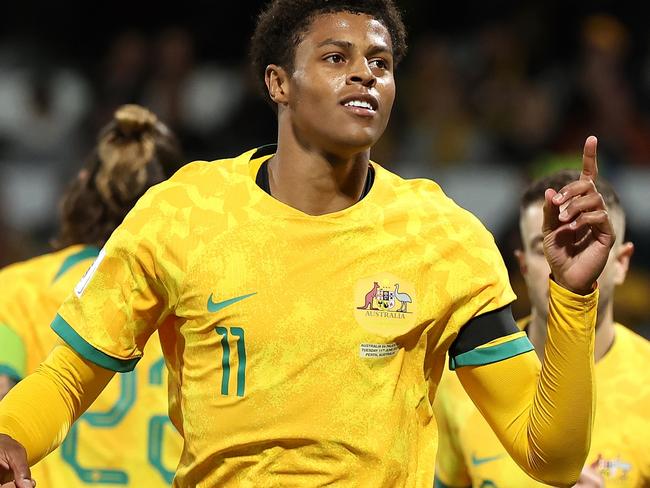 PERTH, AUSTRALIA - JUNE 11: Kusini Yengi of Australia celebrates a goal from a penalty kick during the Second Round FIFA World Cup 2026 Qualifier match between Australia Socceroos and Palestine at HBF Park on June 11, 2024 in Perth, Australia. (Photo by Paul Kane/Getty Images)