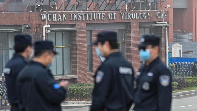 Security personnel outside the Wuhan Institute of Virology in Wuhan. Picture: AFP.