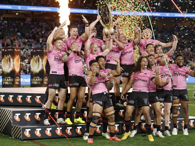 SYDNEY, AUSTRALIA - OCTOBER 06: Isaah Yeo and Nathan Cleary of the Panthers hold aloft the Provan-Summons Trophy after winning the 2024 NRL Grand Final match between the Melbourne Storm and the Penrith Panthers at Accor Stadium on October 06, 2024, in Sydney, Australia. (Photo by Cameron Spencer/Getty Images)