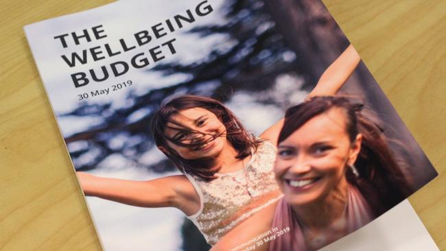 The cover of the New Zealand Wellbeing Budget with Vicky and daughter Ruby-Jean on the front.