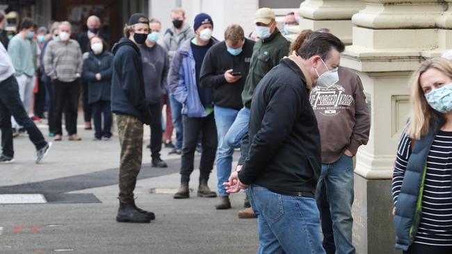 People line up to be tested at the Kilmore COVID-19 testing centre. Picture: David Crosling