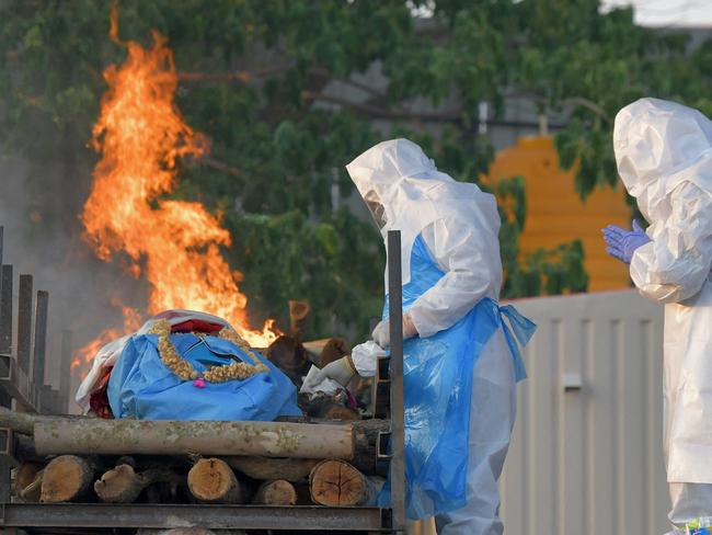 India recorded more than 350,000 COVID-19 cases on Sunday as the country’s death toll mounts. Picture: Manjunath Kiran / AFP