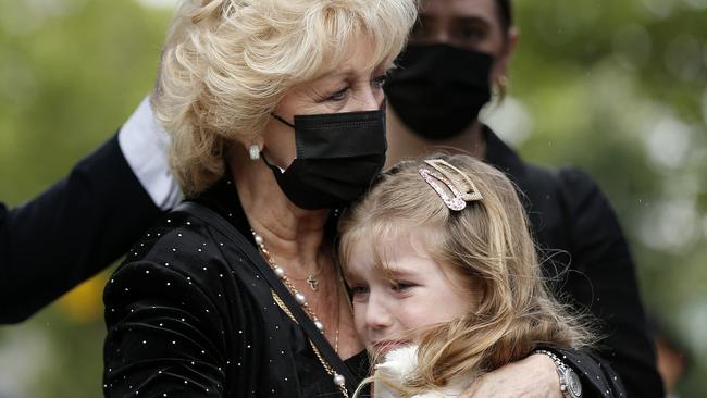 Patti Newton hugs her granddaughter. Picture: Darrian Traynor/Getty Images