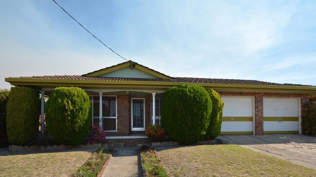 This large brick home is ideal for a large family with views overlooking the town and Mount Marlay at 7 Pierpoint Street, Stanthorpe.