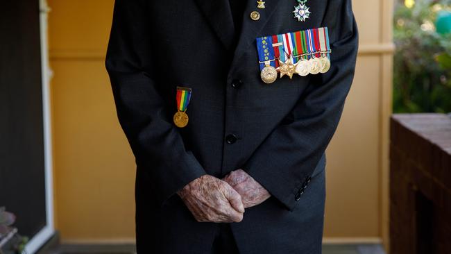 Mr Barry with his medals. Picture: Max Mason-Hubers