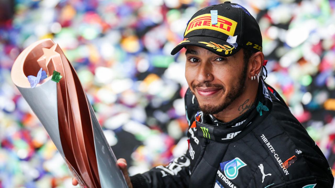 Lewis Hamilton with the spoils of victory in Istanbul. Picture: Getty Images