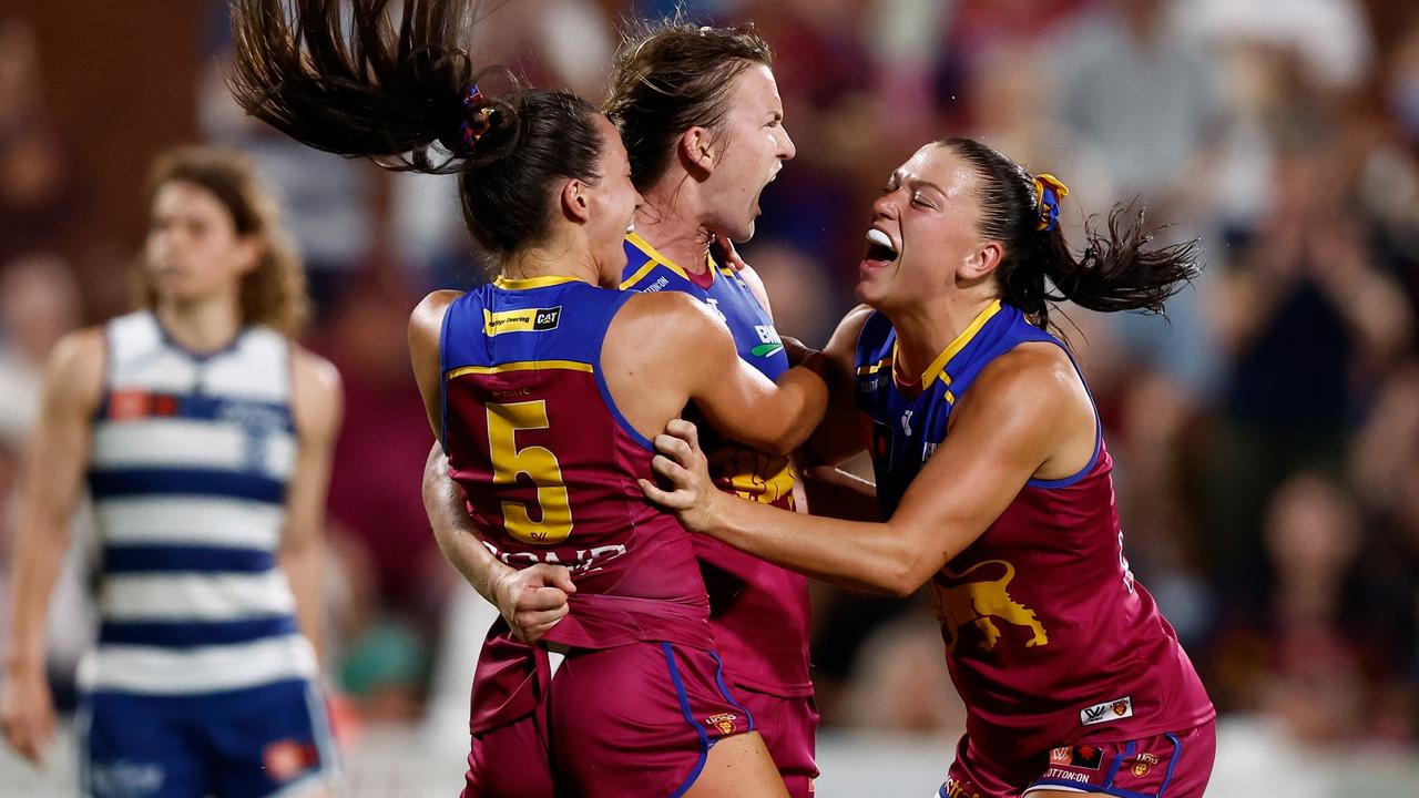 BRISBANE, AUSTRALIA - NOVEMBER 25: (L-R) Jade Ellenger, Shannon Campbell and Poppy Boltz of the Lions celebrate during the 2023 AFLW First Preliminary Final match between The Brisbane Lions and The Geelong Cats at Brighton Homes Arena on November 25, 2023 in Brisbane, Australia. (Photo by Michael Willson/AFL Photos via Getty Images)